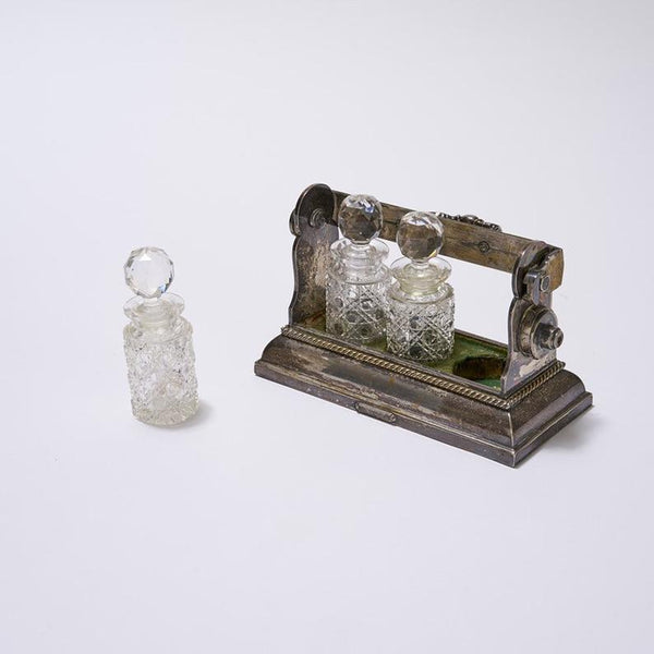 Antique miniature perfume Tantalus by Betjemann’s of London with cut crystal bottles