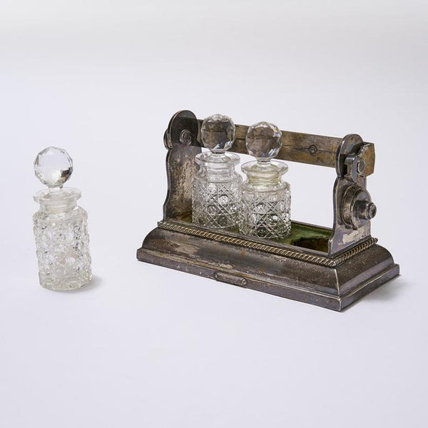 Antique miniature perfume Tantalus by Betjemann’s of London with cut crystal bottles