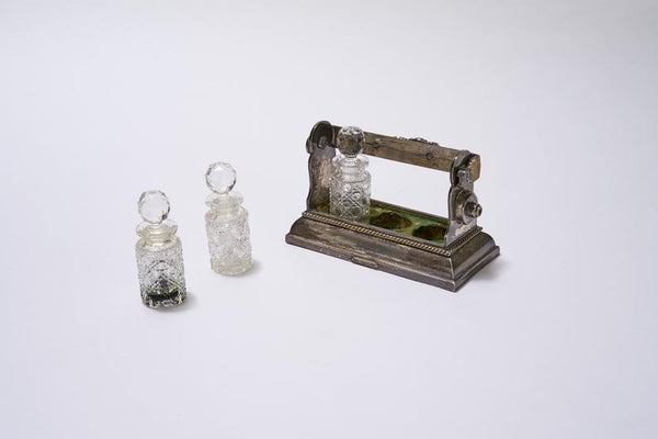 Antique miniature perfume Tantalus by Betjemann’s of London with cut crystal bottles