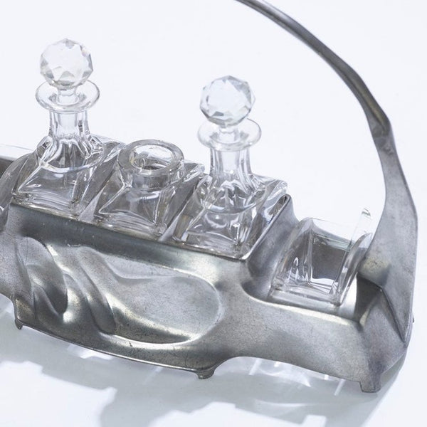 Art Nouveau pewter and crystal cruet set designed by Hugo Leven for Kayserzinn