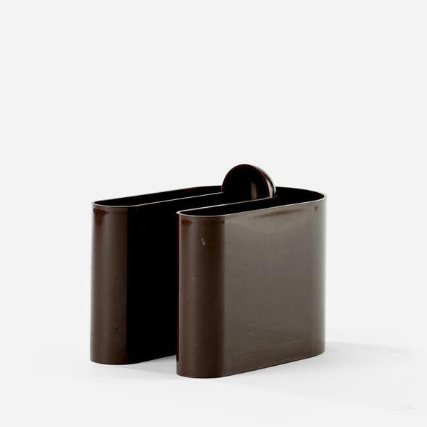 Brown plastic magazine holder designed by Rodolfo Bonetto