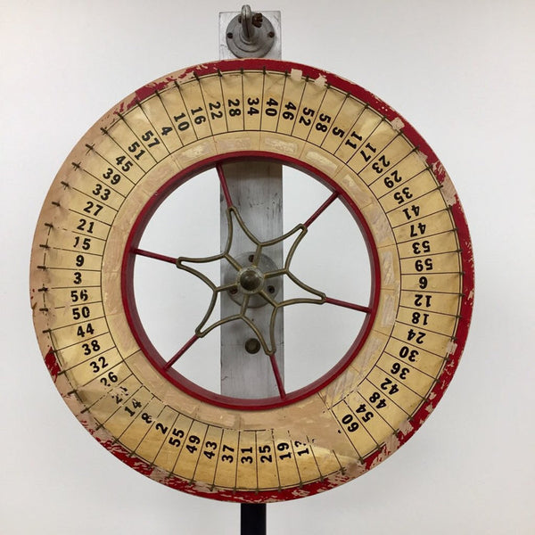 Large vintage carnival roulette or gaming wheel