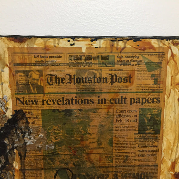 Newspaper and paint on canvas