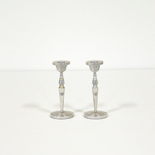 Pair of industrial machine age candlesticks