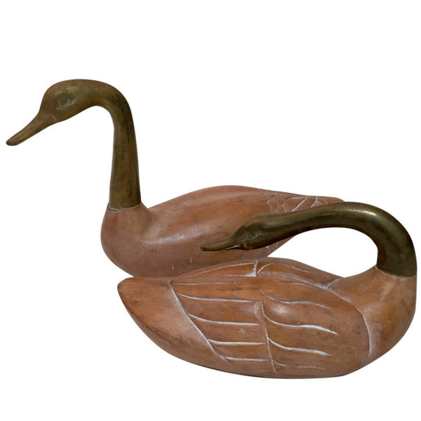 Pair of wood and brass decorative swans by Frederick Cooper