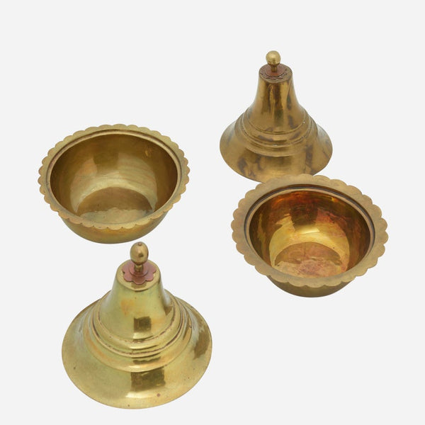 Pair of brass bowls with brass and copper lids