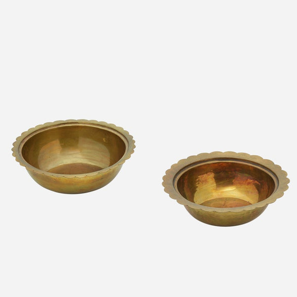 Pair of brass bowls with brass and copper lids