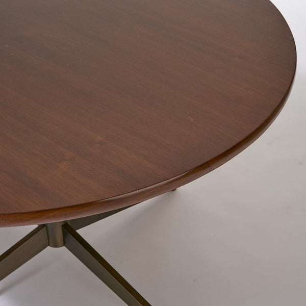 Round walnut dining table with bronze base