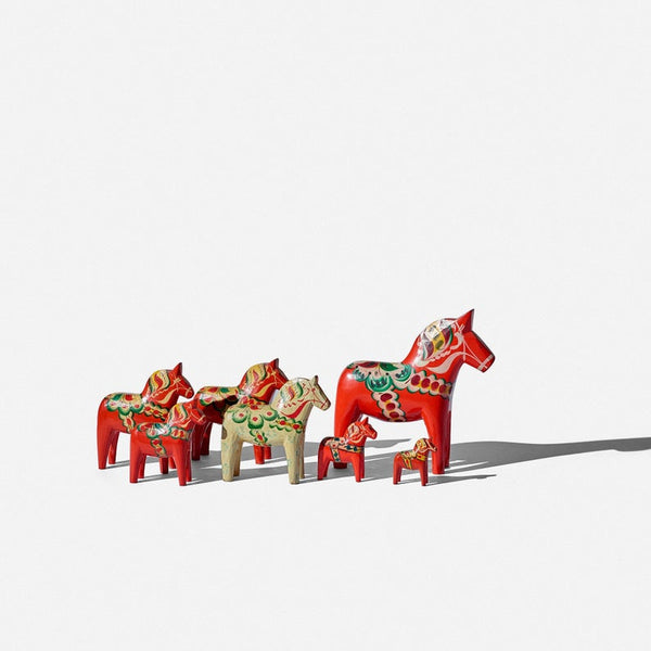 Set of seven Dala horses by Nils Olsson