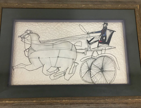 Vintage Saul Steinberg fabric called “Horses”, quilted into a piece of framed art