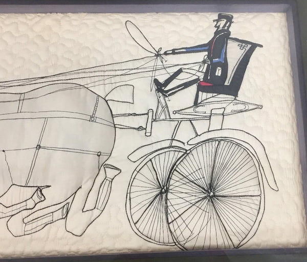 Vintage Saul Steinberg fabric called “Horses”, quilted into a piece of framed art