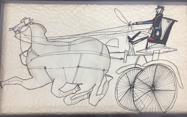 Vintage Saul Steinberg fabric called “Horses”, quilted into a piece of framed art