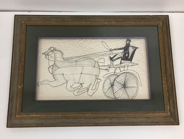 Vintage Saul Steinberg fabric called “Horses”, quilted into a piece of framed art