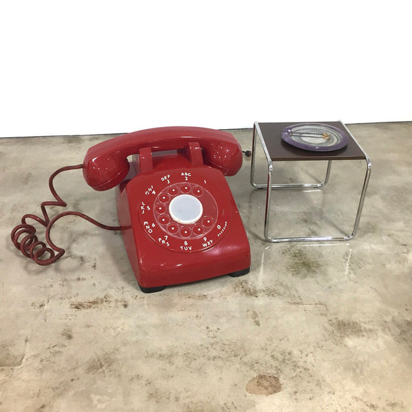 Vintage, giant-sized, candy red, plastic Western electric telephone with light-up rotary dial