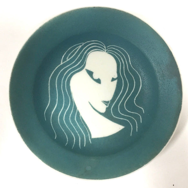 Vintage green and white dish or bowl with stylized Art Deco female bust made