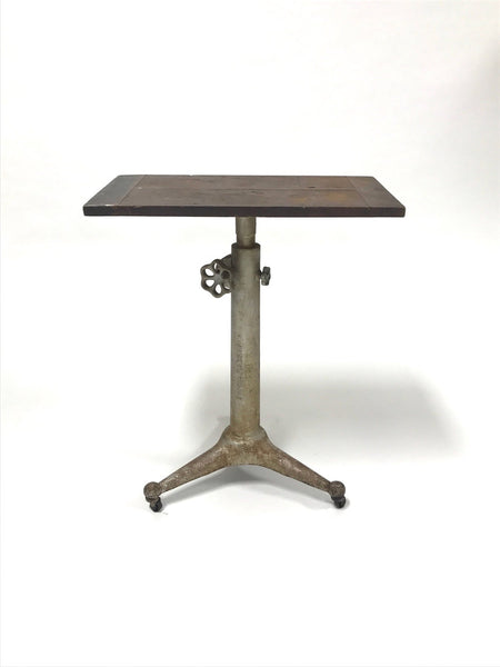 Vintage telescoping industrial table with casters