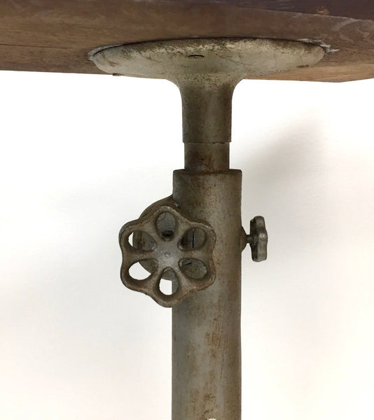 Vintage telescoping industrial table with casters