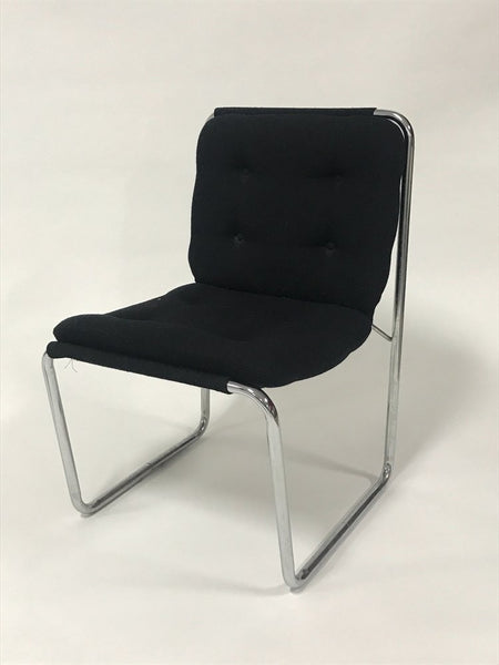 Pair of black upholstered tubular steel Cosco sling chairs