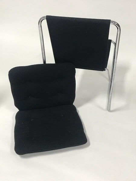 Pair of black upholstered tubular steel Cosco sling chairs