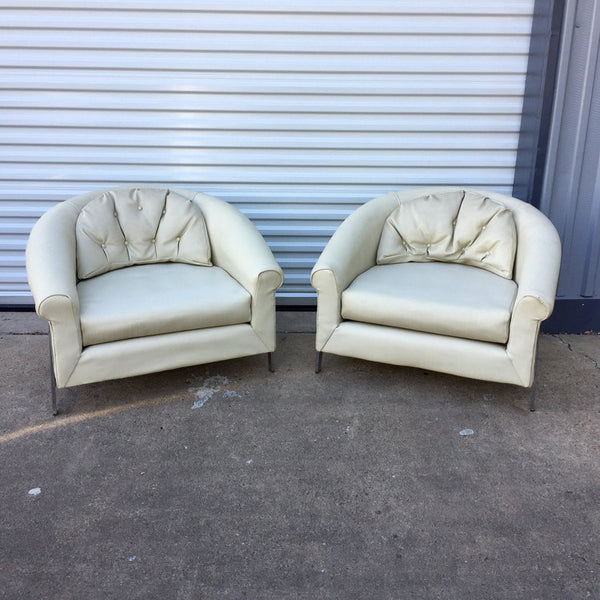 Pair of large white vinyl and chrome lounge chairs