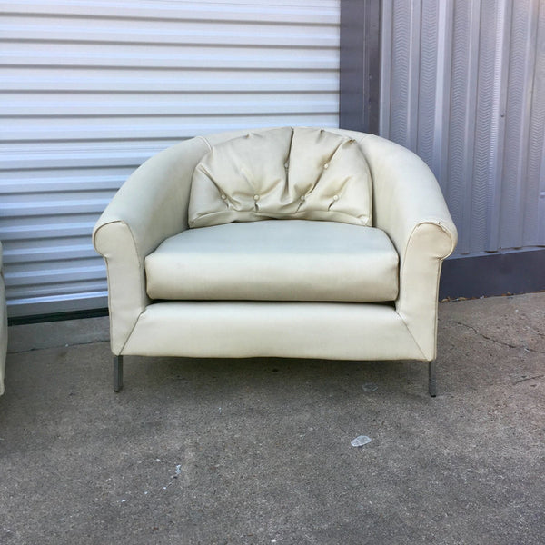 Pair of large white vinyl and chrome lounge chairs